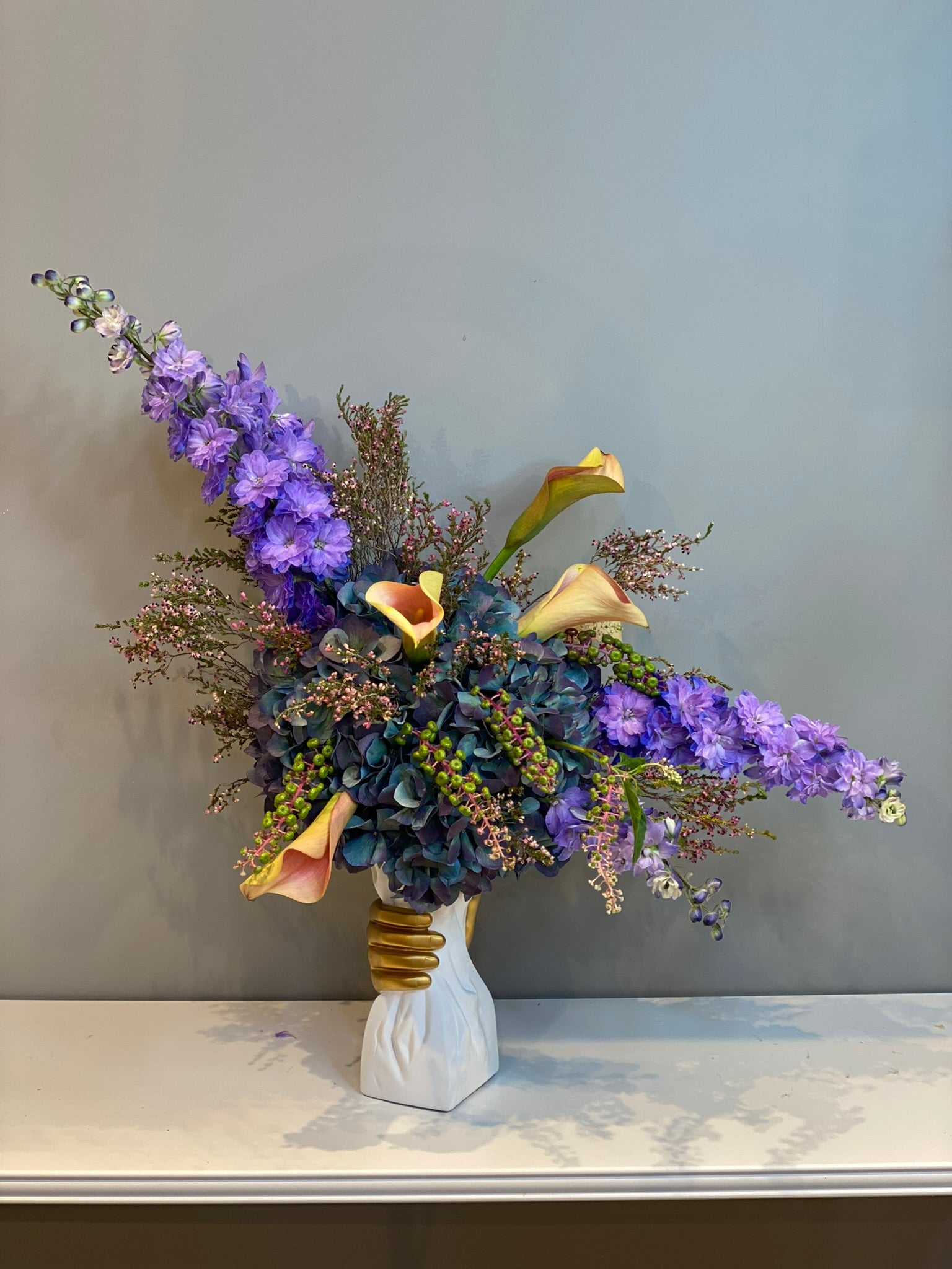 Artistic Purple & Orange Flower Arrangement - Delphinium, Calla Lilies & Hydrangeas in Designer Vase Dubai
