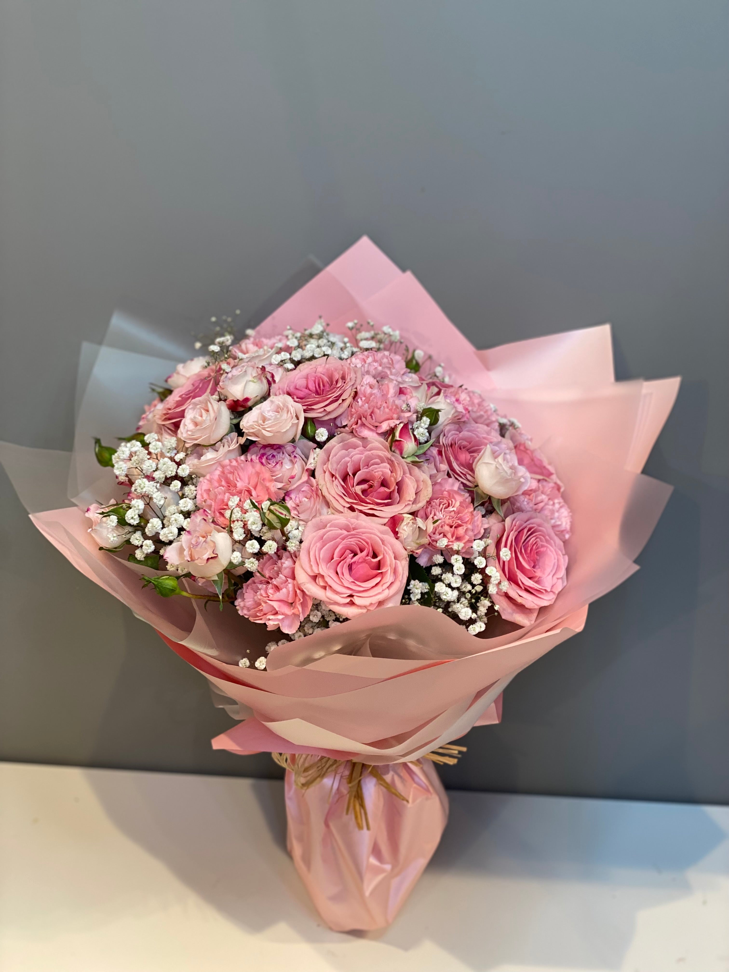 Premium Pink Rose & Carnation Bouquet - Soft Pink Roses, Carnations & Baby's Breath in Elegant Pink Wrapping Dubai