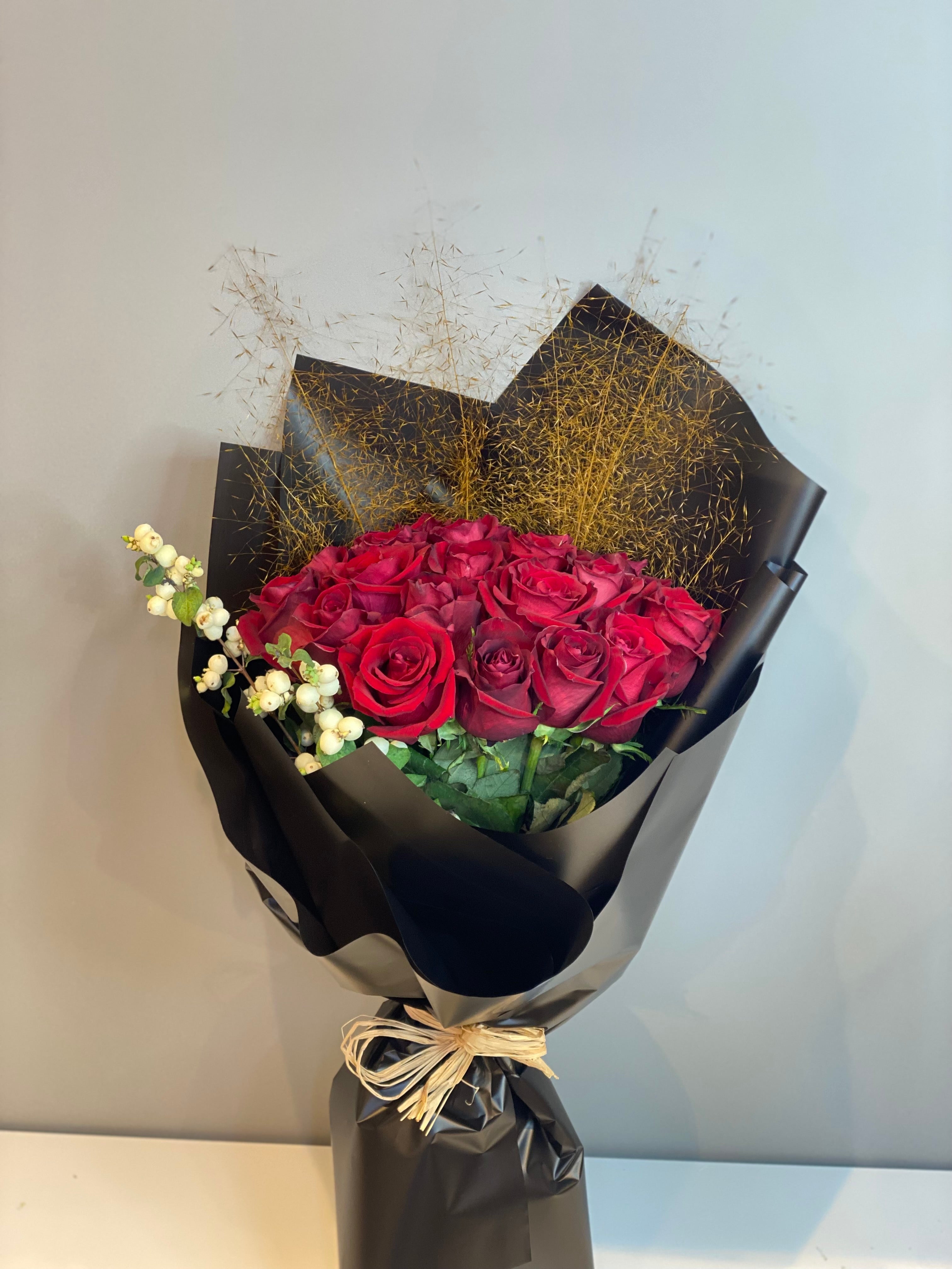 Elegant Red Rose Bouquet - Premium Deep Red Roses with White Hypericum in Luxury Black Wrapping Dubai