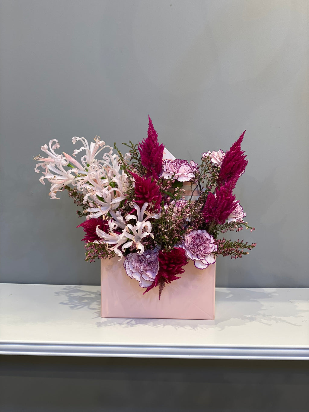 Elegant Pink & Burgundy Mixed Arrangement - Nerine Lilies, Celosia & Carnations in Pink Box Dubai