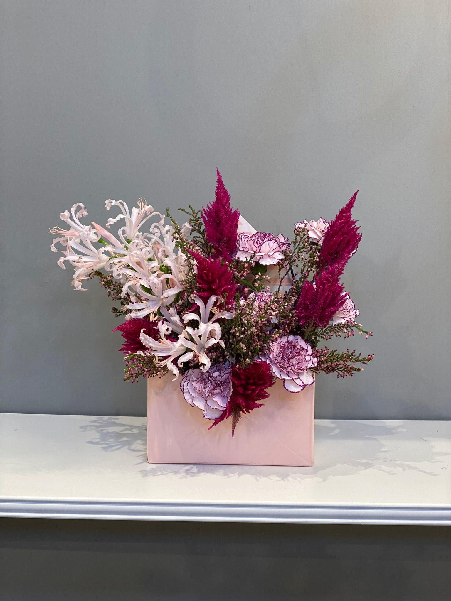 Elegant Pink & Burgundy Mixed Arrangement - Nerine Lilies, Celosia & Carnations in Pink Box Dubai