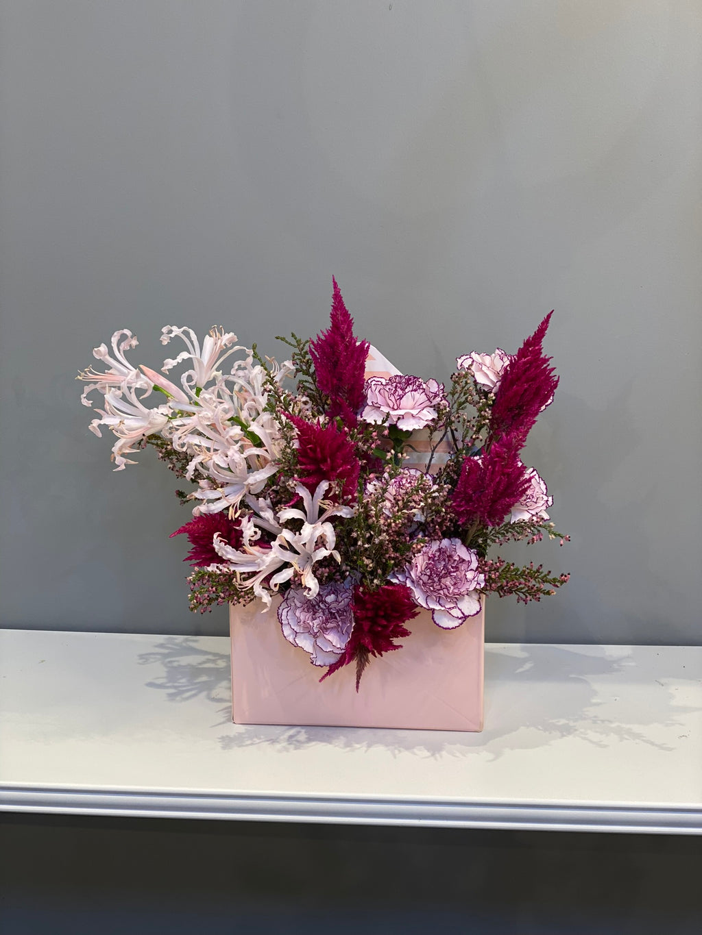 Elegant Pink & Burgundy Mixed Arrangement - Nerine Lilies, Celosia & Carnations in Pink Box Dubai