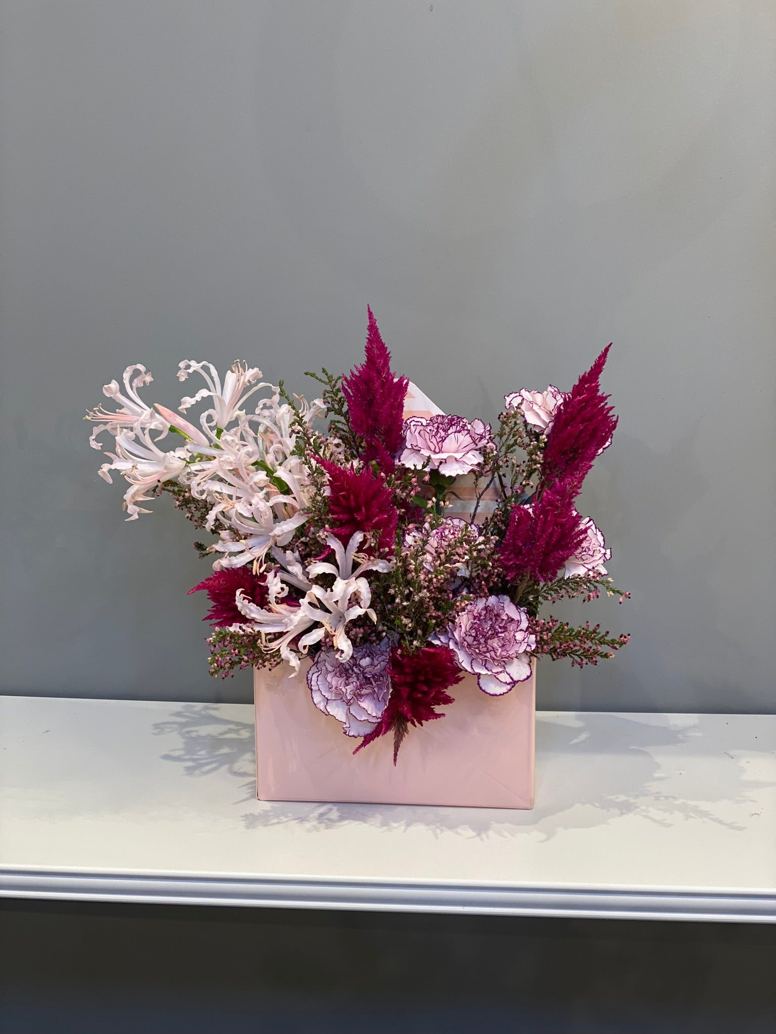 Elegant Pink & Burgundy Mixed Arrangement - Nerine Lilies, Celosia & Carnations in Pink Box Dubai