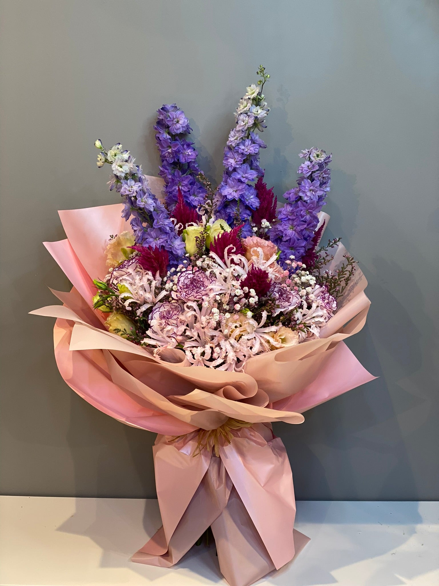 Premium Purple Larkspur & Mixed Flower Bouquet - Delphinium, Nerine Lilies & Chrysanthemums in Pink Wrapping Dubai