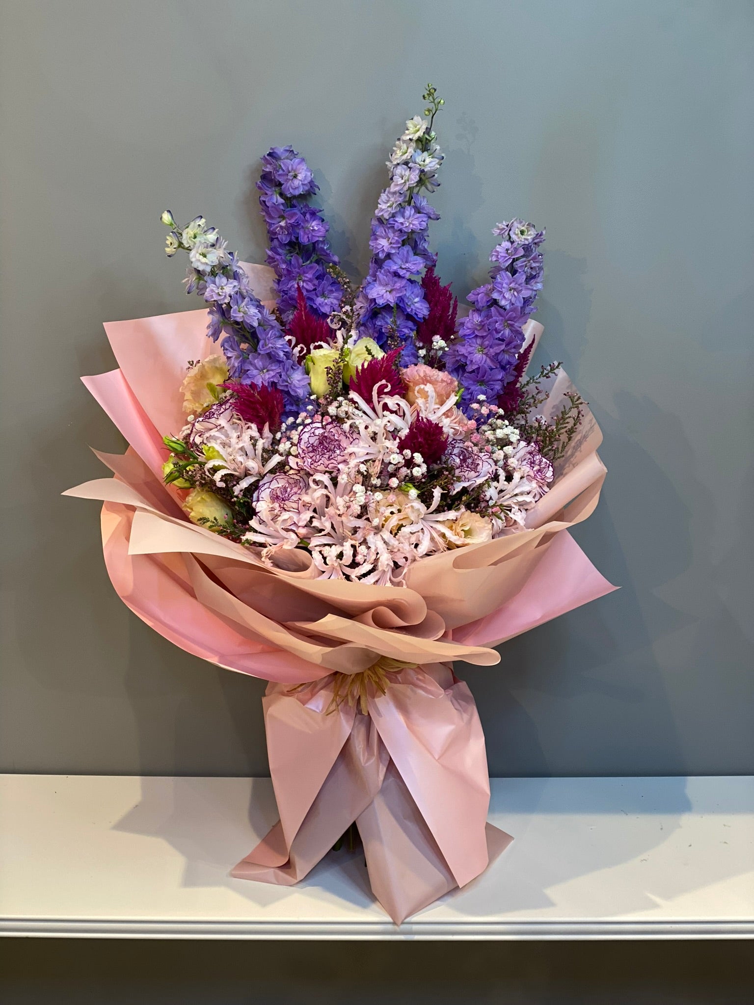 Premium Purple Larkspur & Mixed Flower Bouquet - Delphinium, Nerine Lilies & Chrysanthemums in Pink Wrapping Dubai